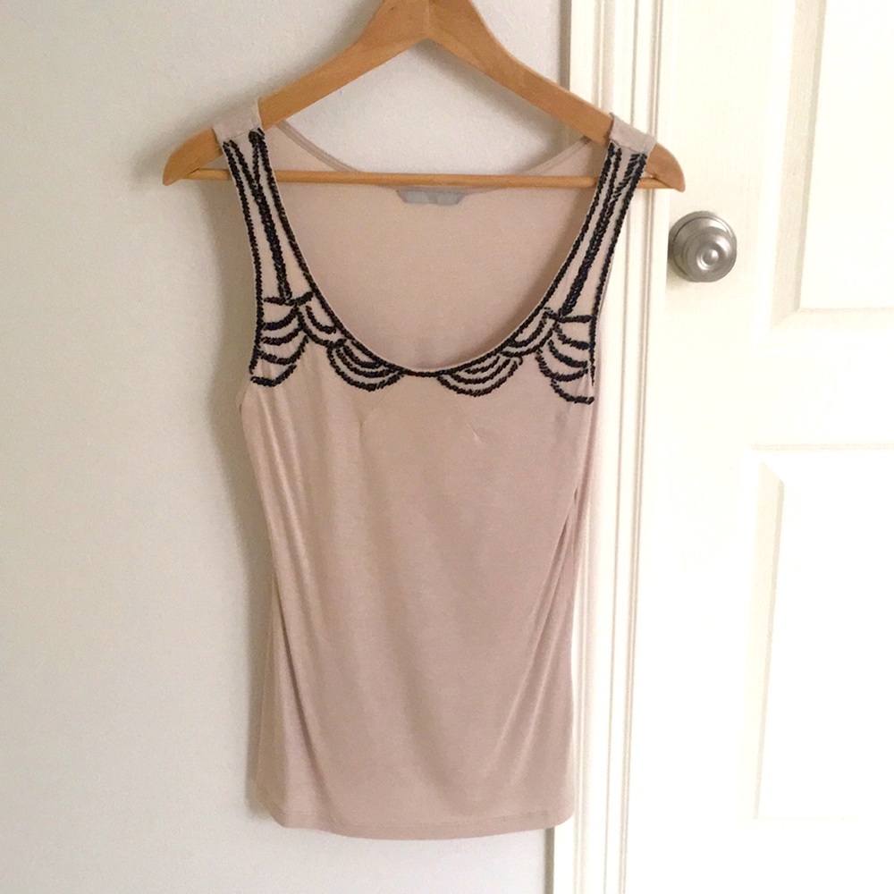 Sleeveless top with black beading